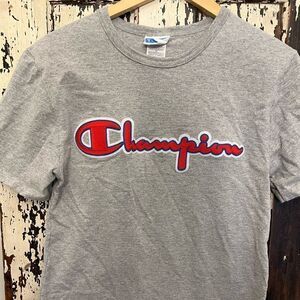 Embroidered Champion T-shirt. Size Small. Unisex.
